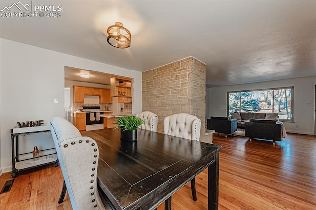 dining area featuring light hardwood / wood-style flooring