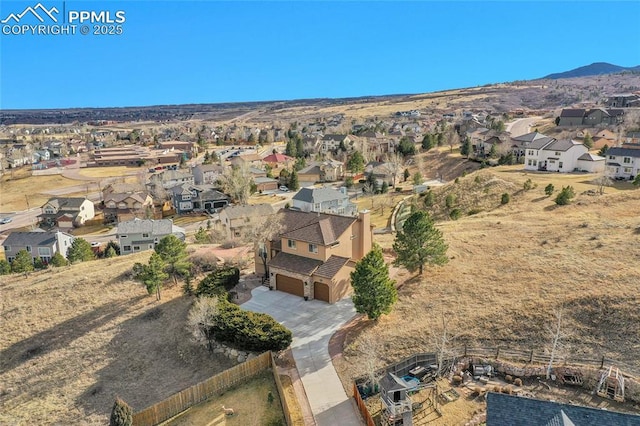 aerial view with a residential view and a mountain view