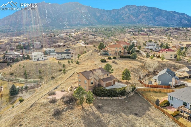 birds eye view of property featuring a residential view and a mountain view