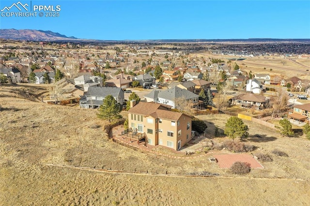 bird's eye view with a mountain view and a residential view