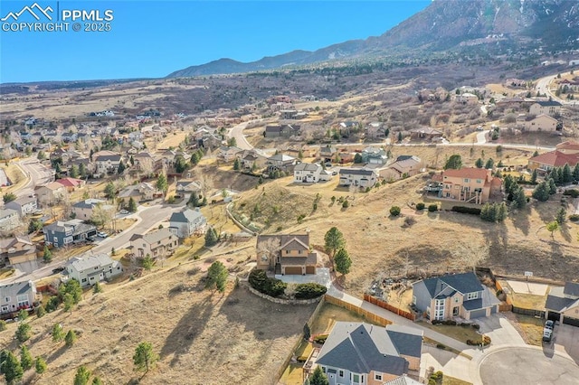 bird's eye view with a mountain view and a residential view