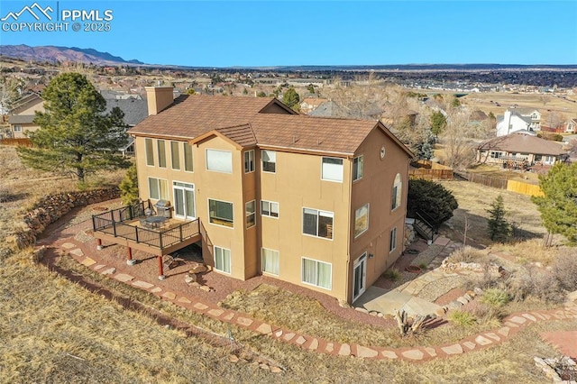 exterior space featuring a mountain view