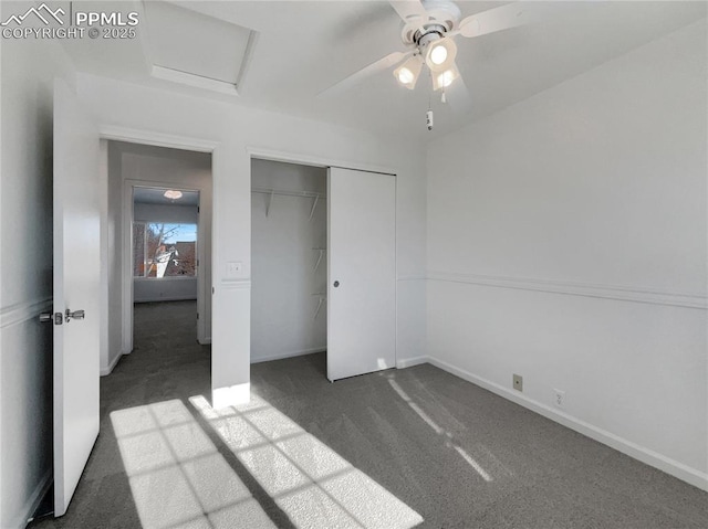 unfurnished bedroom with ceiling fan, a closet, and carpet