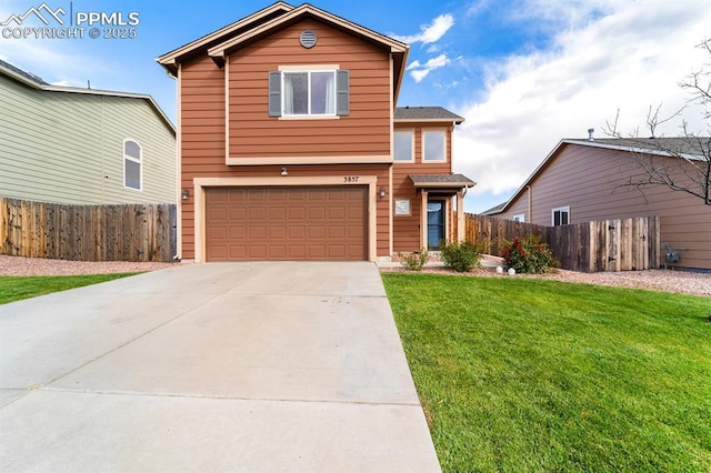 front of property featuring a garage and a front lawn