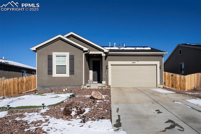 ranch-style house featuring a garage