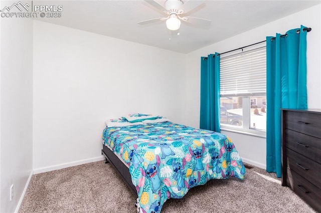 bedroom featuring a ceiling fan, baseboards, and carpet flooring