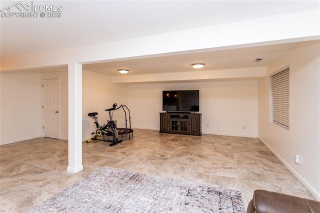 workout room featuring visible vents and baseboards