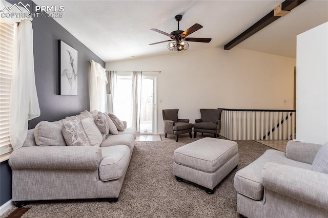 carpeted living room featuring lofted ceiling with beams and ceiling fan