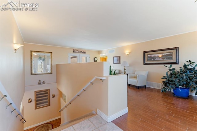 staircase with wood-type flooring