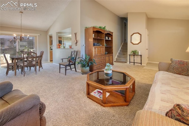 carpeted living room featuring an inviting chandelier, vaulted ceiling, and a textured ceiling