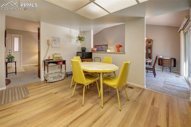 dining room featuring light hardwood / wood-style floors