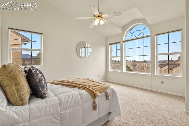 bedroom with vaulted ceiling, carpet, and ceiling fan