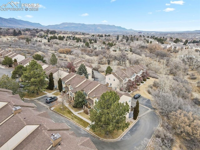 drone / aerial view featuring a mountain view