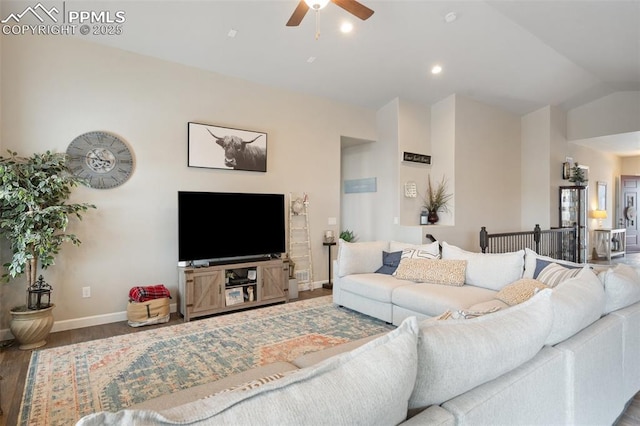 living room with lofted ceiling, hardwood / wood-style flooring, and ceiling fan