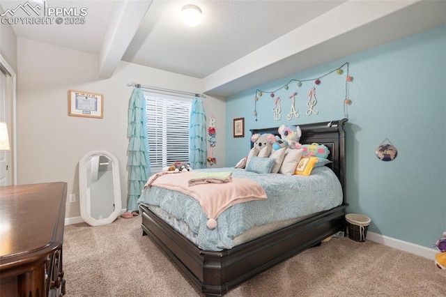 bedroom with beamed ceiling and light colored carpet