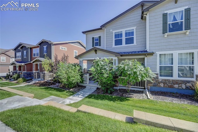 view of front of home with a front yard