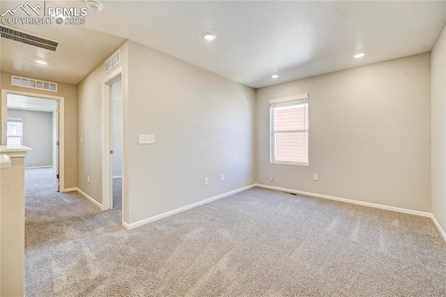 view of carpeted spare room