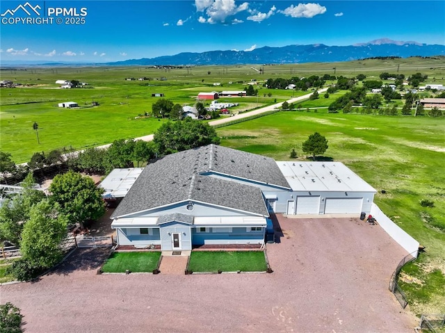 bird's eye view with a mountain view and a rural view