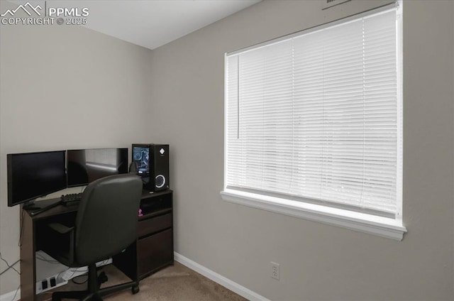 home office featuring carpet flooring