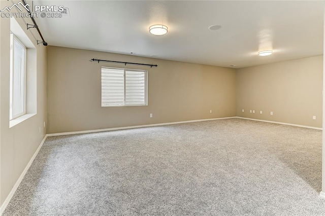 spare room with carpet flooring