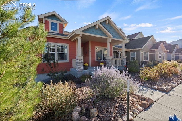 craftsman-style house featuring covered porch