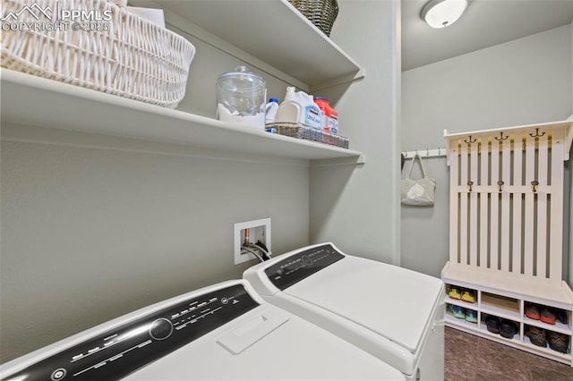 washroom featuring washer and dryer and laundry area