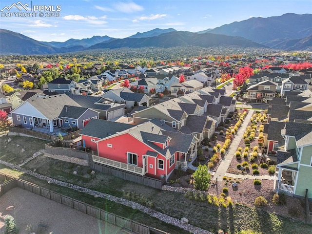 bird's eye view featuring a residential view and a mountain view