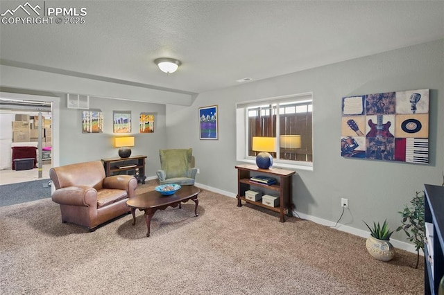 living area with carpet, visible vents, a textured ceiling, and baseboards