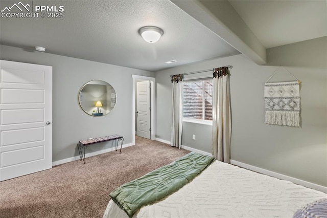 carpeted bedroom featuring a textured ceiling, beamed ceiling, and baseboards