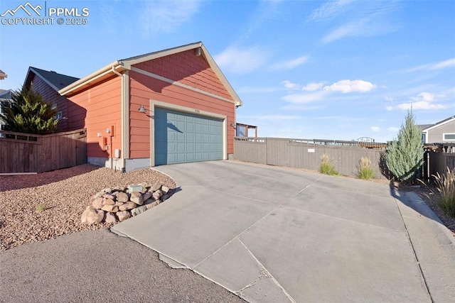 garage featuring fence