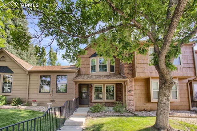 view of front of property with a front lawn