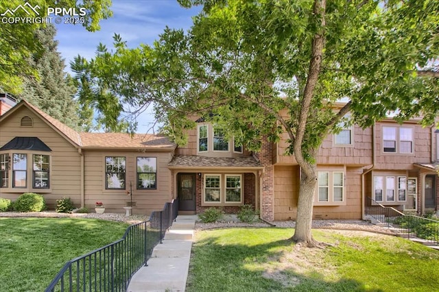 view of front of property with a front lawn