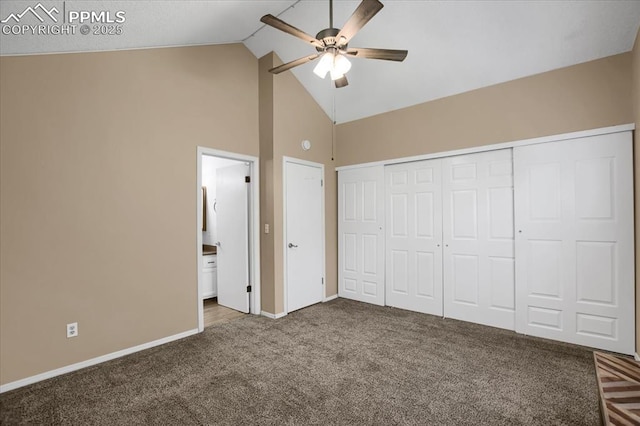 unfurnished bedroom with ensuite bath, ceiling fan, high vaulted ceiling, carpet, and a closet