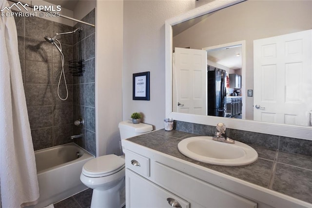 bathroom featuring tile patterned flooring, vanity, toilet, and shower / bathtub combination with curtain