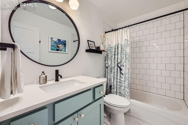 full bathroom with vanity, shower / tub combo, and toilet