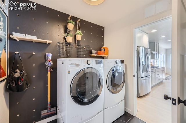 laundry area featuring separate washer and dryer