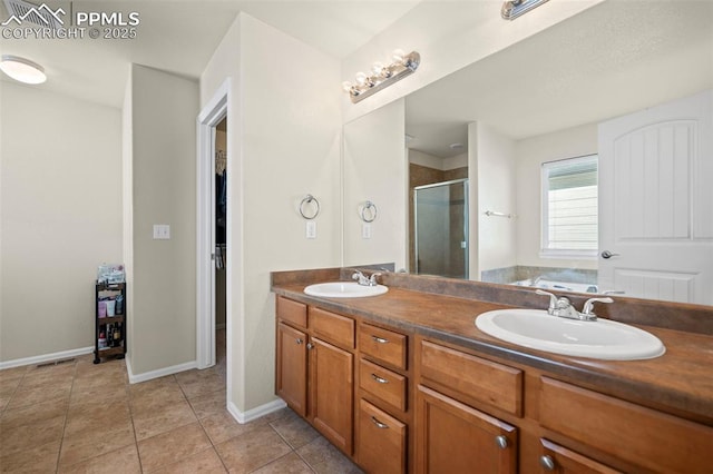 bathroom featuring vanity, tile patterned floors, and plus walk in shower