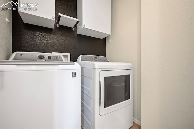 laundry area featuring independent washer and dryer