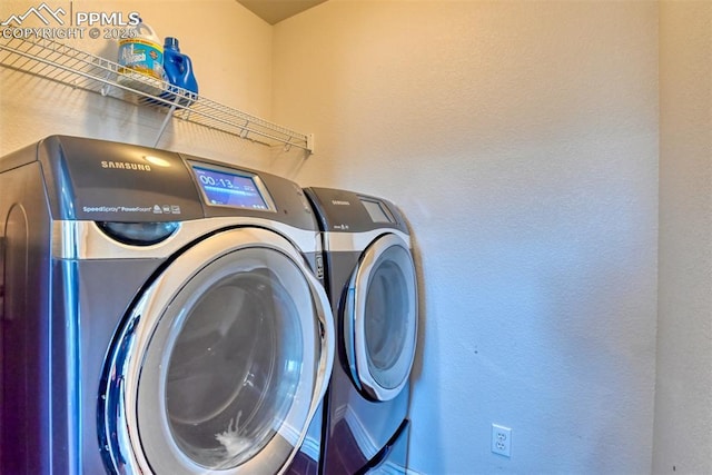 washroom with separate washer and dryer