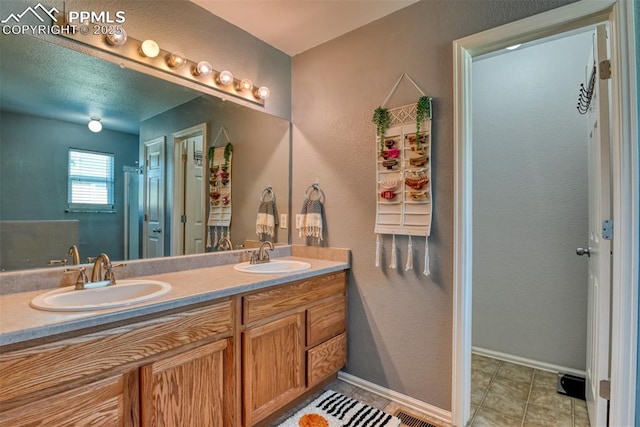 bathroom featuring vanity and tile patterned floors