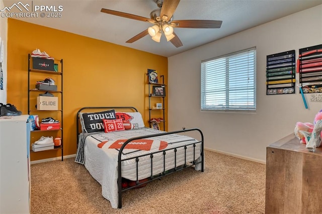 bedroom with ceiling fan and light colored carpet