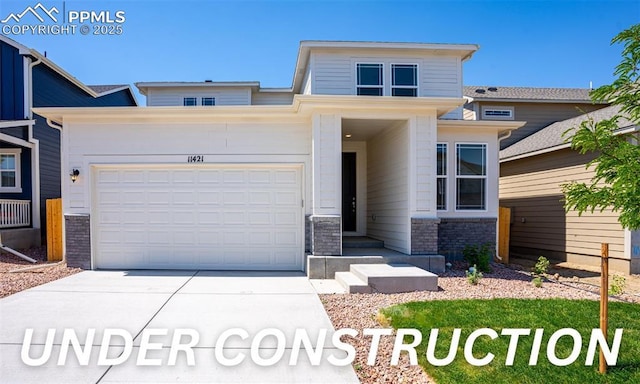 view of front of property with a garage