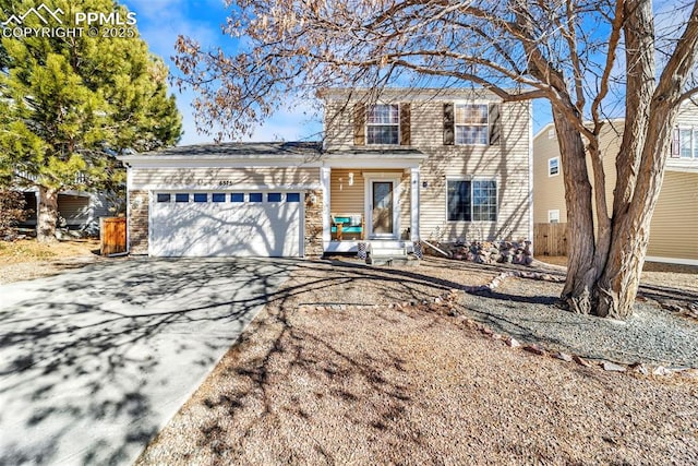 view of front of property with a garage