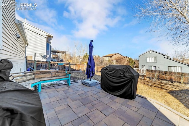 view of patio featuring a pergola and grilling area