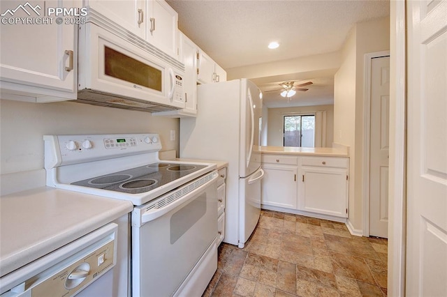 kitchen featuring ceiling fan, white appliances, and white cabinets