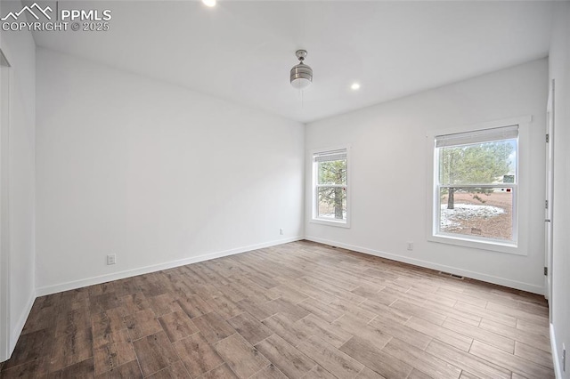 20 Apache Cir, Florissant, CO 80816 - empty room with baseboards, wood finished floors, and visible vents