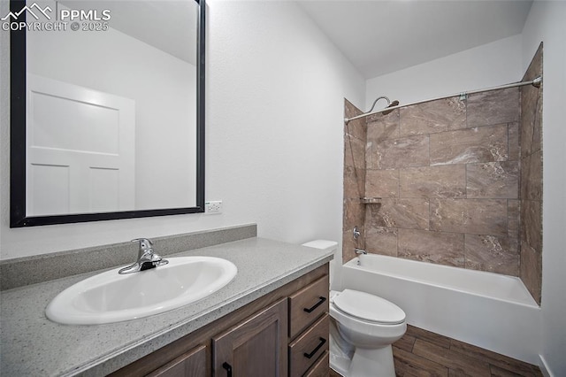 20 Apache Cir, Florissant, CO 80816 - full bath with toilet, vanity, wood finished floors, and tub / shower combination