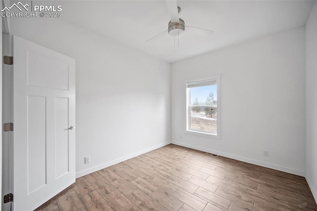 20 Apache Cir, Florissant, CO 80816 - spare room with wood finished floors, visible vents, baseboards, and ceiling fan