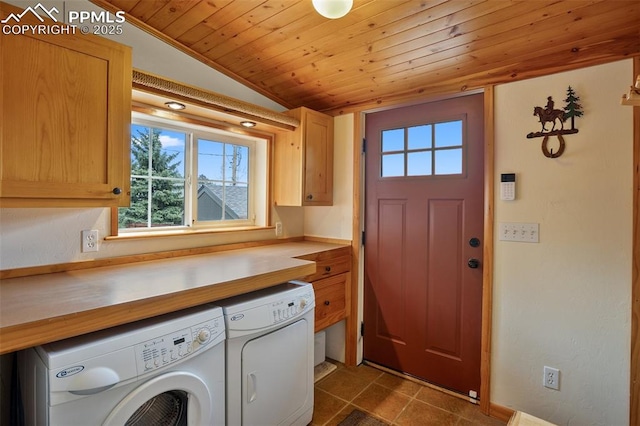 washroom with cabinets, washer and clothes dryer, and wooden ceiling