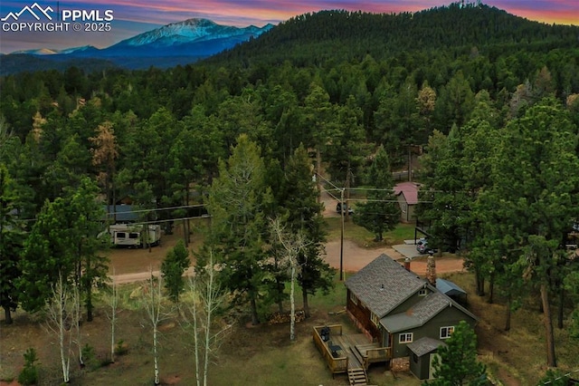 aerial view at dusk with a mountain view